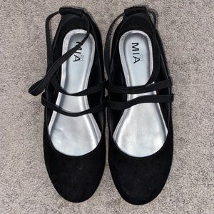 Black flats with a ballet style wrap